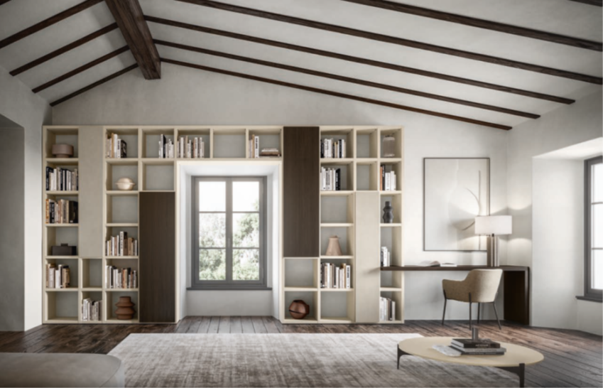 COMPOSIZIONE LIBRERIA HNL008 Modern interior with a bookshelf, desk, chair, and large windows in a bright room.