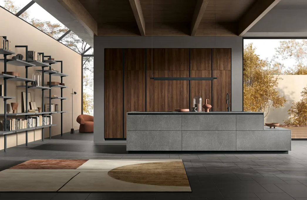 Moderna cucina minimalista con parete in legno e pavimento in cemento, adornata da tappeti.