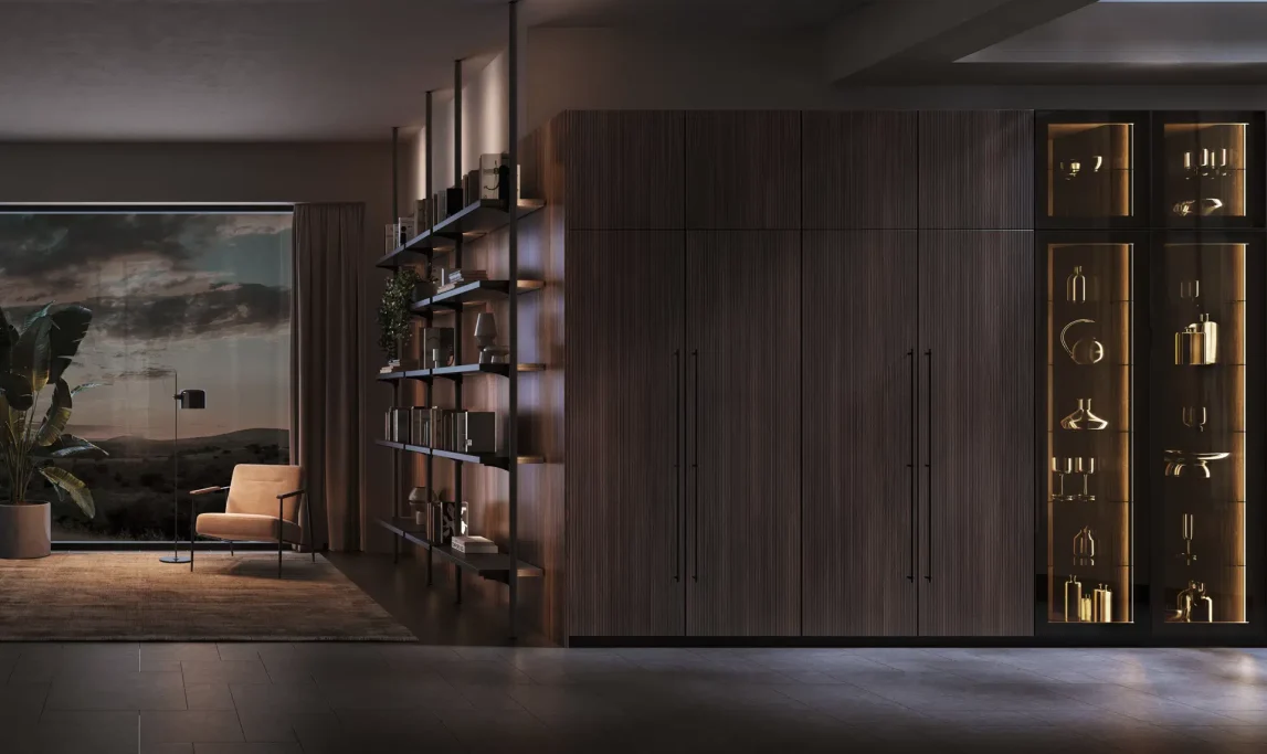 Modern interior with wooden shelves, a cozy chair, and large windows showing a scenic view.