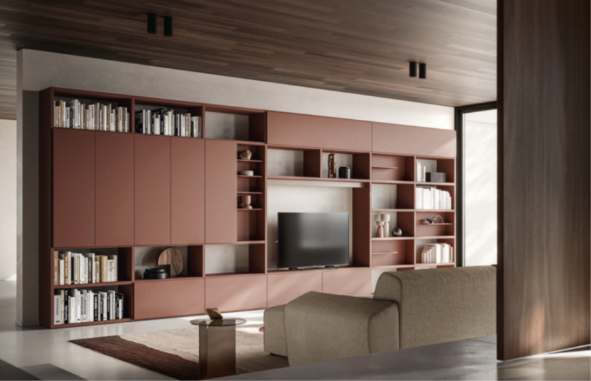 LIBRERIA ATTREZZATA Soggiorno moderno con parete attrezzata in legno, TV e divano.
