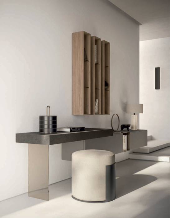 COMPOSIZIONE GREY Modern vanity in neutral tones with a round stool, wall mirror, and decorative items.