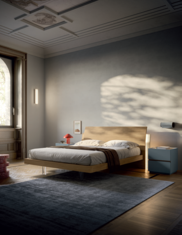 LETTO CONPIEDINI TRASPARENTI Minimalist bedroom with wooden bed, soft lighting, and blue nightstand.