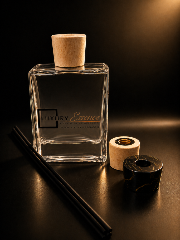 Perfume bottle with wooden cap, tape, and a black straw on a dark background.